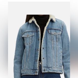 New Levi’s Sherpa lined trucker jacket . Juniors size XL . Divided blue